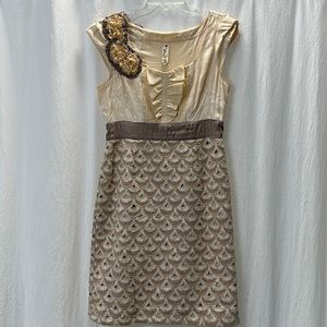 Cream cap sleeve knee length dress with lace skirt